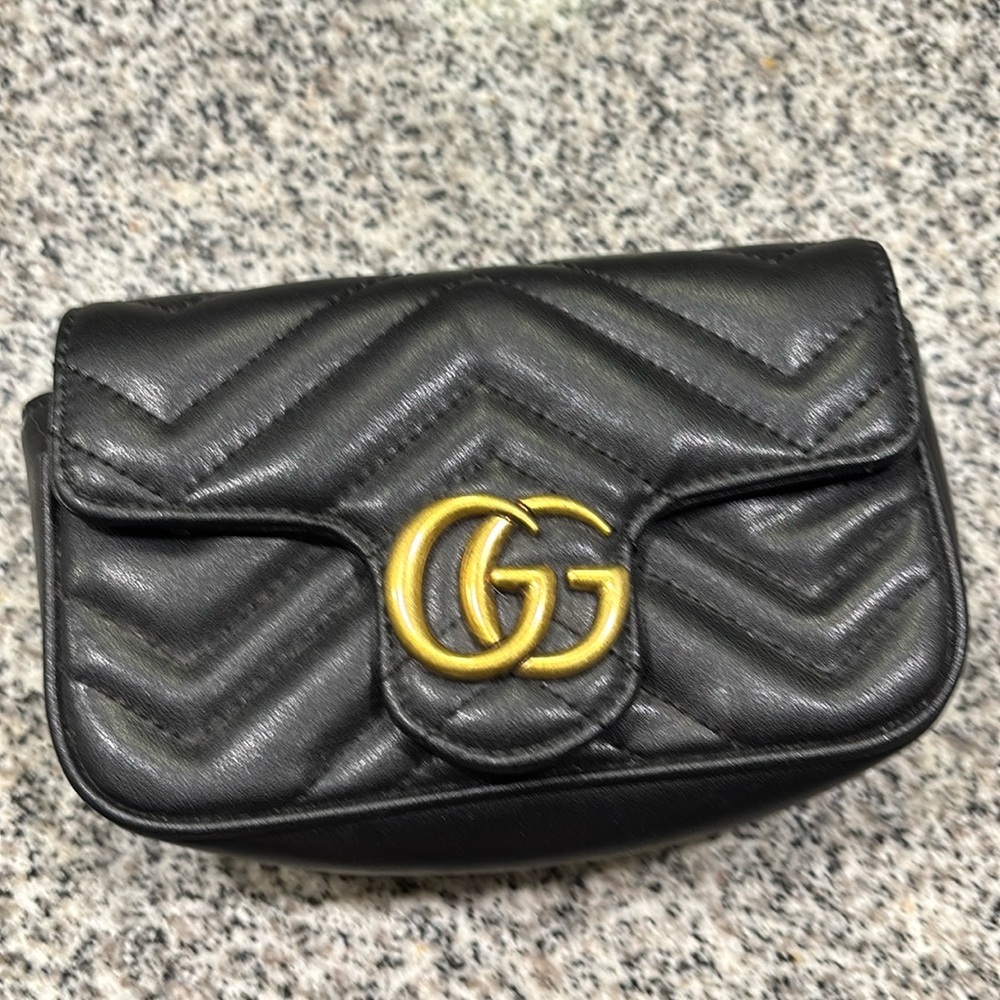 Gucci crossbody or clutch purse